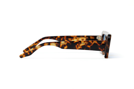 Sunglasses handmade rectangular tortoise acetate polarized sunglasses for men and women fitted by optometrists in Bali for glare reduction.