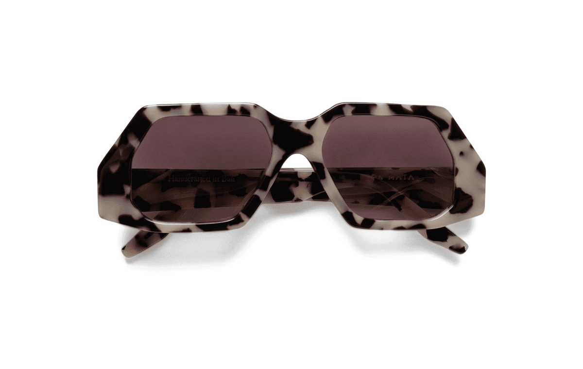 Maison Mata Mahogany mirage jaguar tortoiseshell acetate oversized sunglasses, three-quarter view with brown gradient lenses