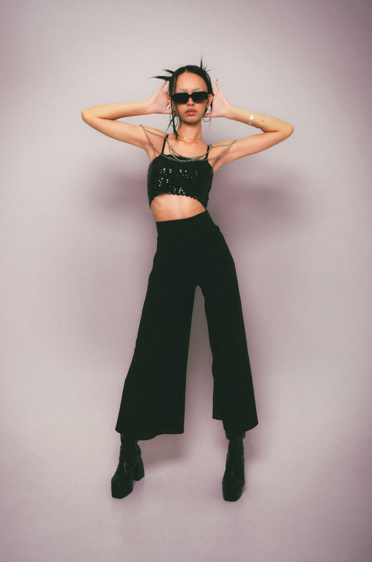 Handmade women’s sunglasses showcased on a female model in Seminyak in Bali and fitted by expert optometrists.