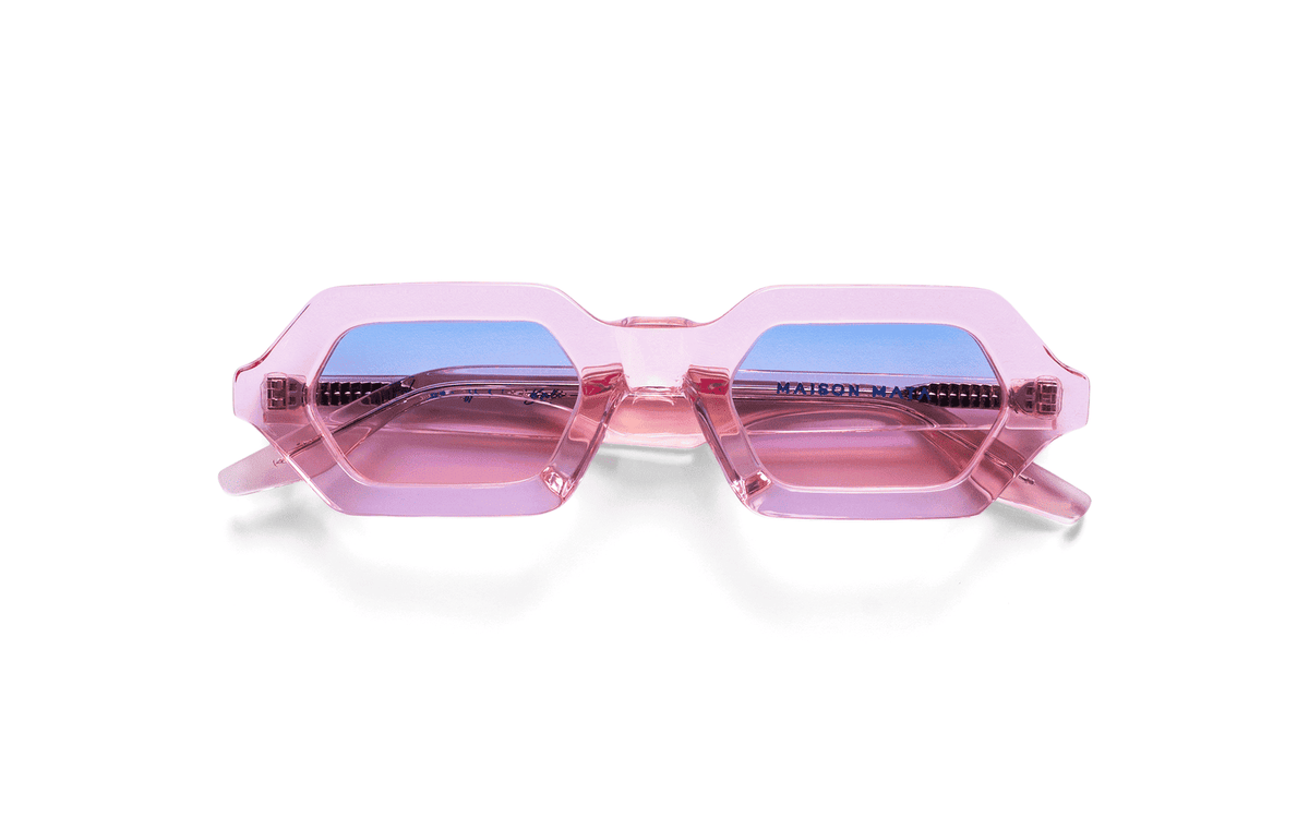 Maison Mata Tequila sunrise translucent pink acetate hexagonal sunglasses, three-quarter view with blue to pink gradient lenses