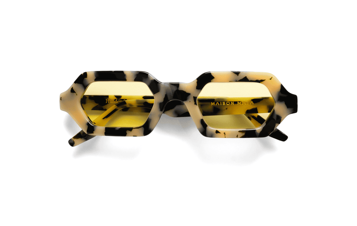 Maison Mata Tequila sunrise jaguar tortoiseshell acetate hexagonal sunglasses, three-quarter view with yellow lenses