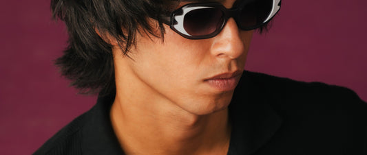Man wearing a white and black rectangular sunglass frame, Maison Mata