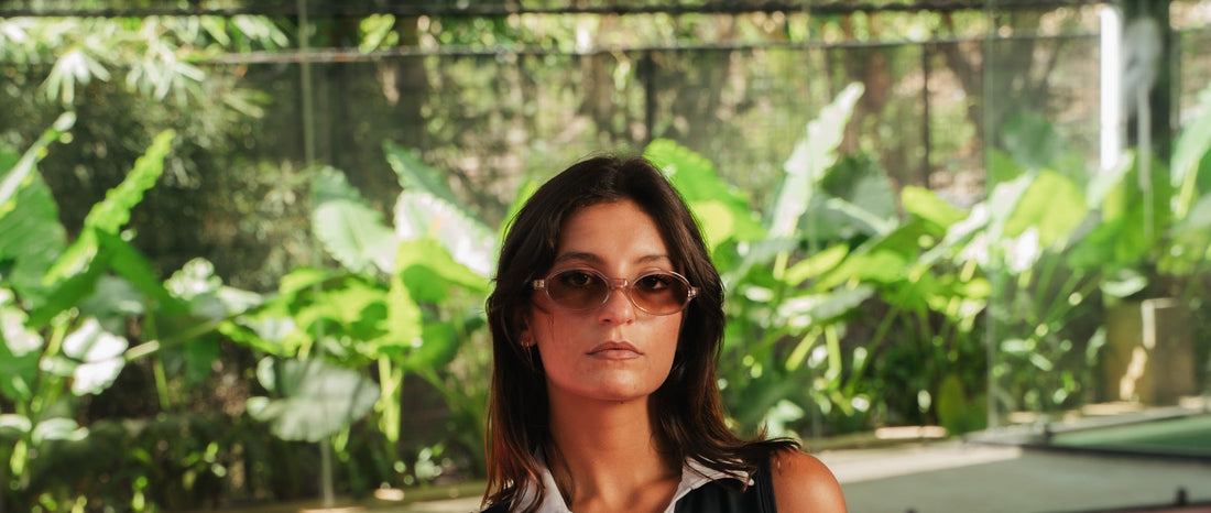 Woman wearing sunglasses in bright tropical daylight, Maison Mata Bali