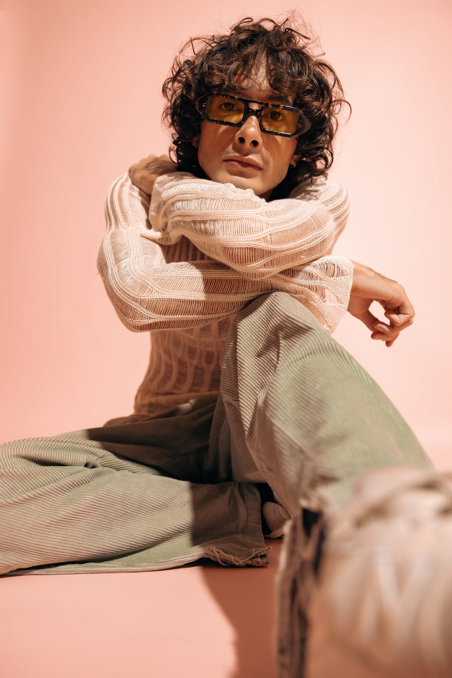 Minimalist handmade polarized sunglasses for men styled near sunset in Seminyak in Bali refined by optical specialists.