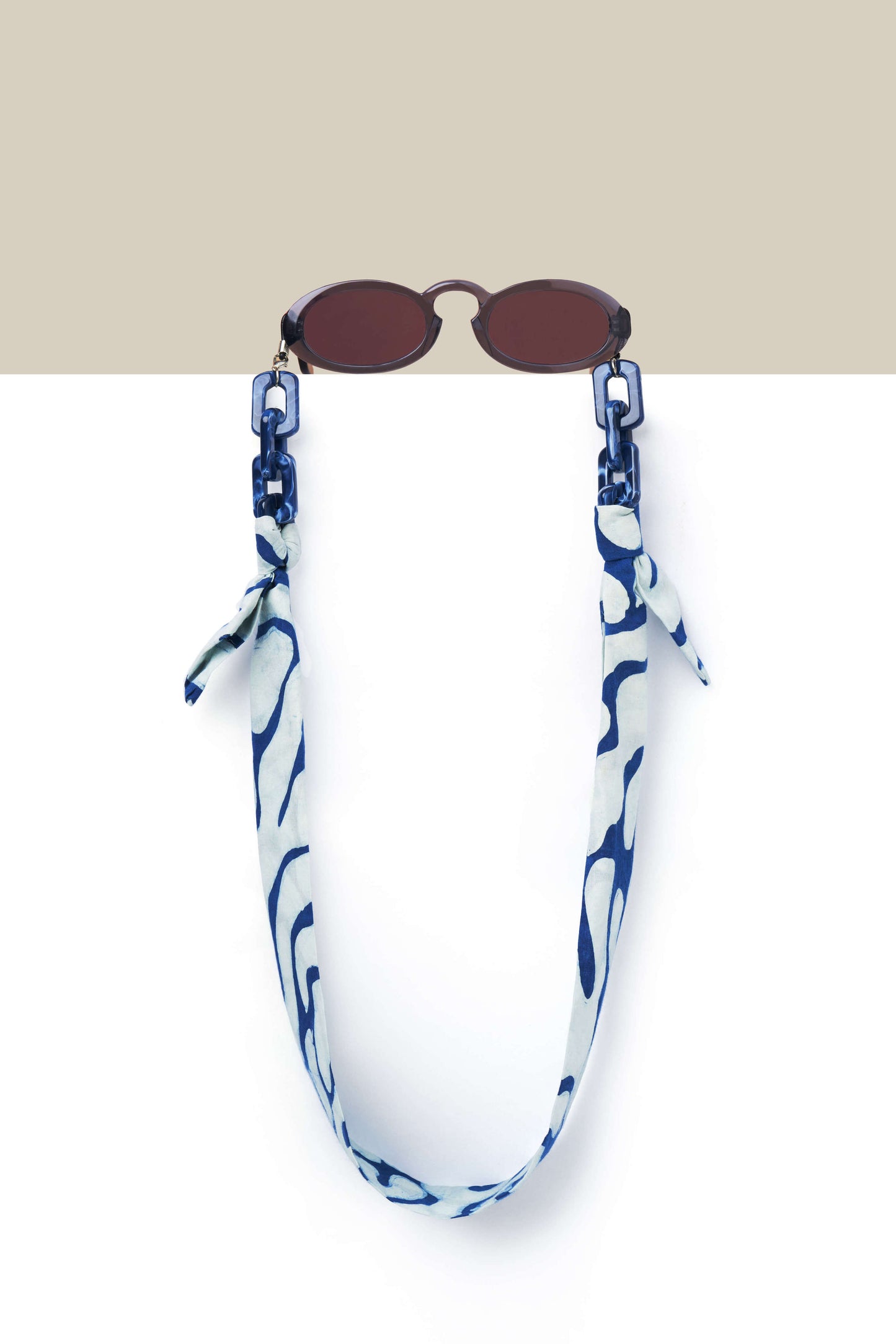Maison Mata glasses chain crafted in batik shibori, cultural textile art from Java.