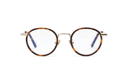 Optical round tortoise acetate glasses with blue-light protection fitted by Maison Mata opticians in Sanur in Bali.