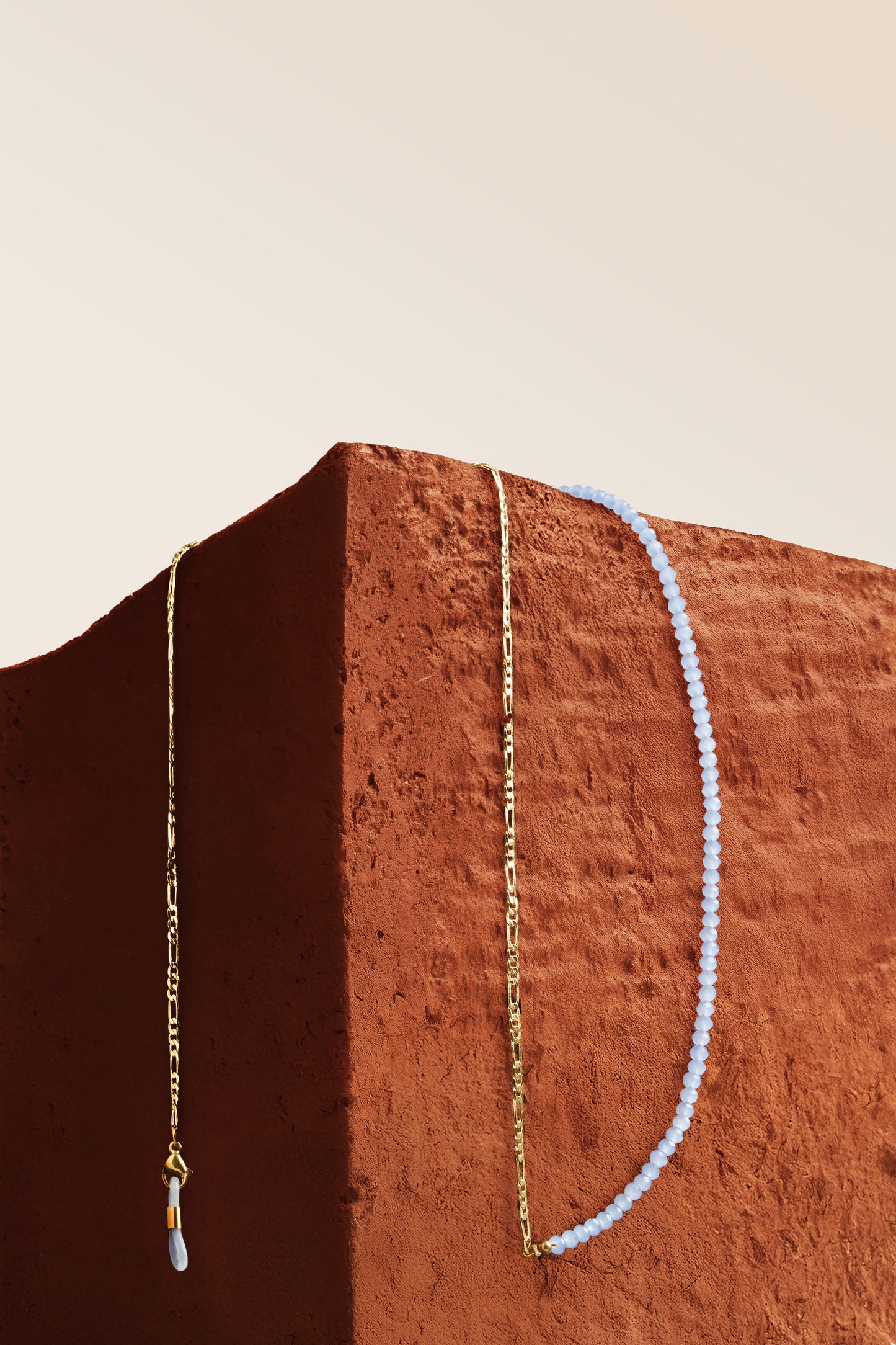 Gold plated eyewear chain with semi-precious stone, handmade in Bali for women’s sunglasses.