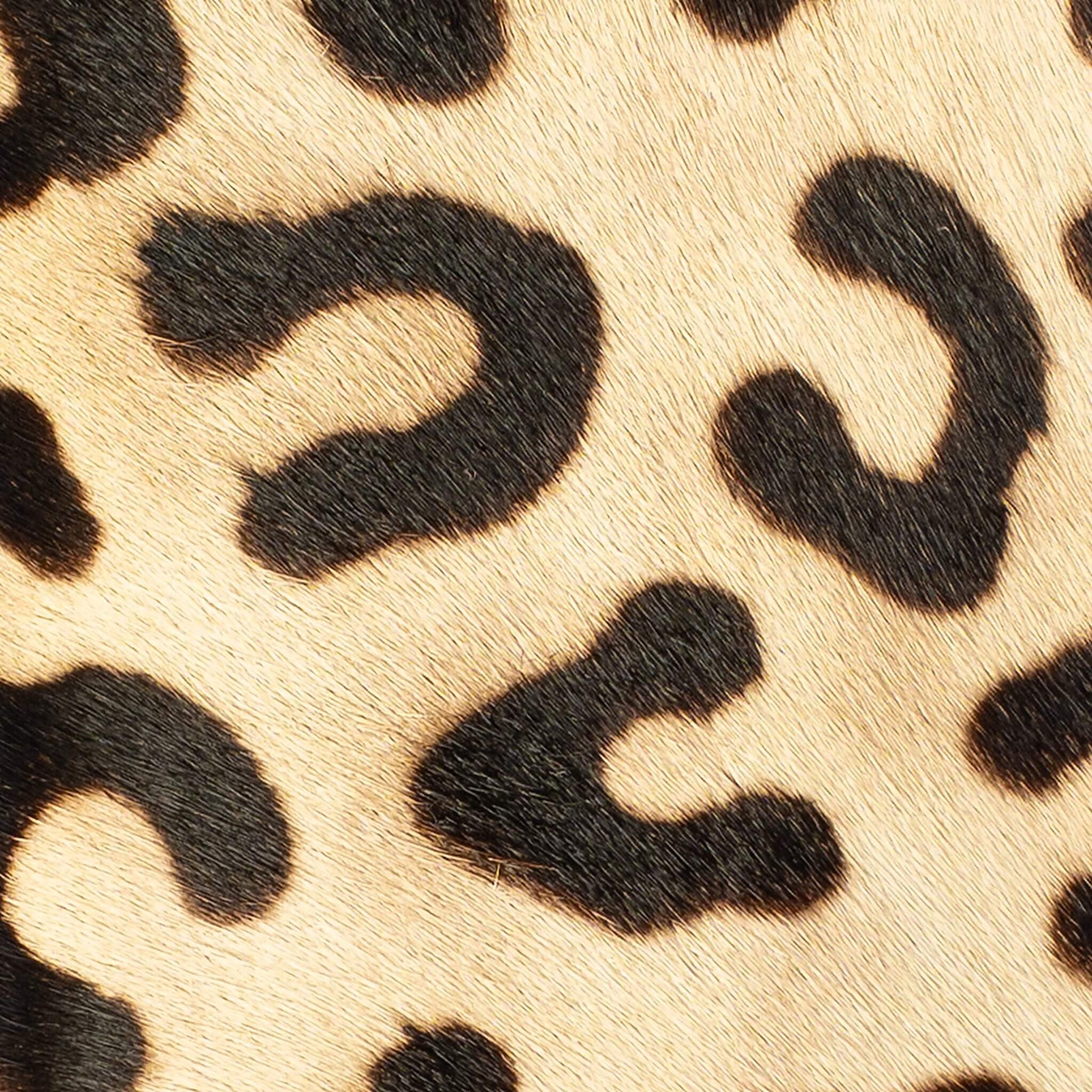 Close-up of the hair-on hide on the Maison Mata black leopard softcase