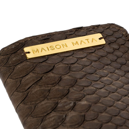 Engraved brass Maison Mata plate on the Sepia snake softcase