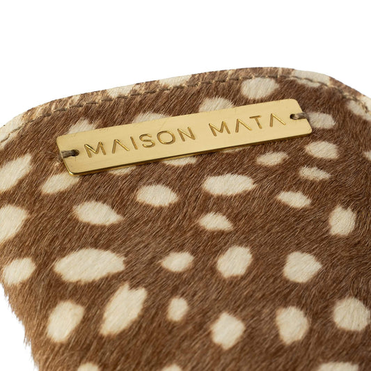 Engraved brass Maison Mata plate on the Fawn softcase