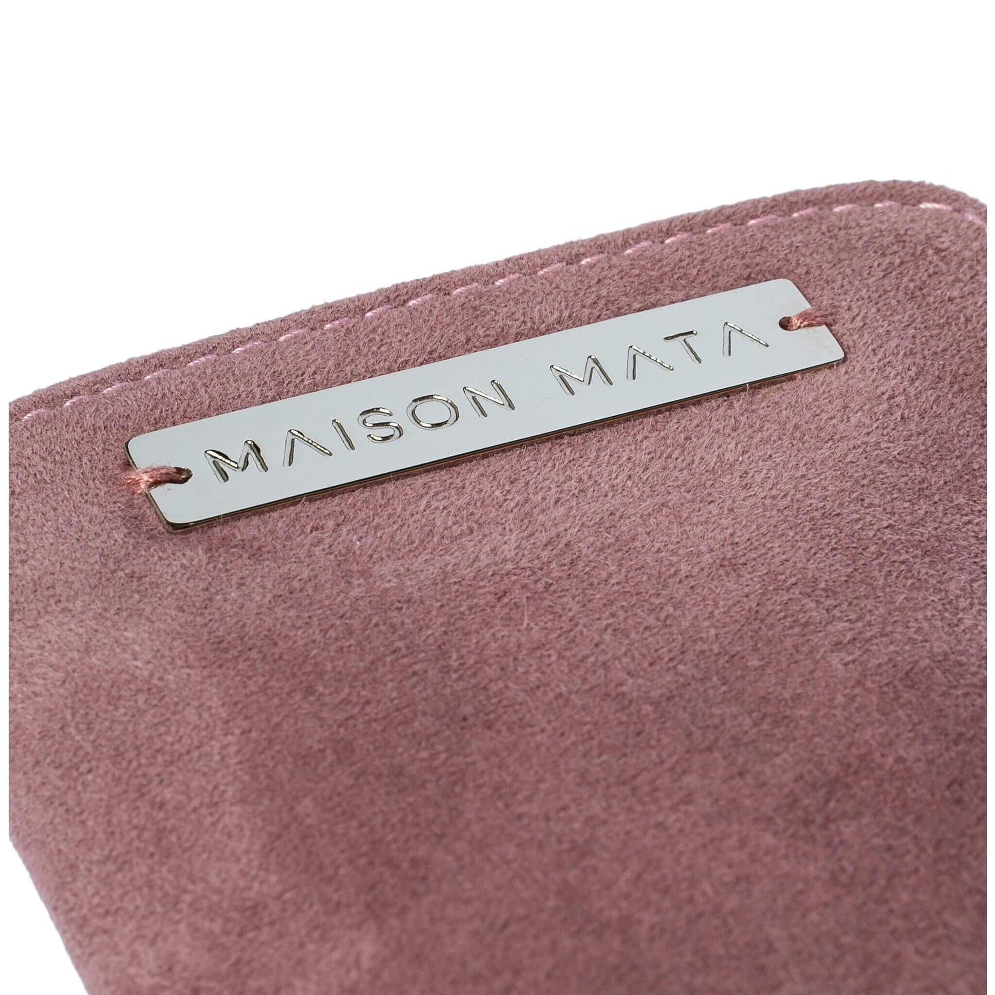 Engraved silver Maison Mata plate on the dusty suede softcase