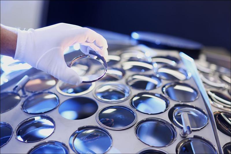 Essilor corrective lens manufacturing with blue-light protection and premium surface treatments for modern optical frames.