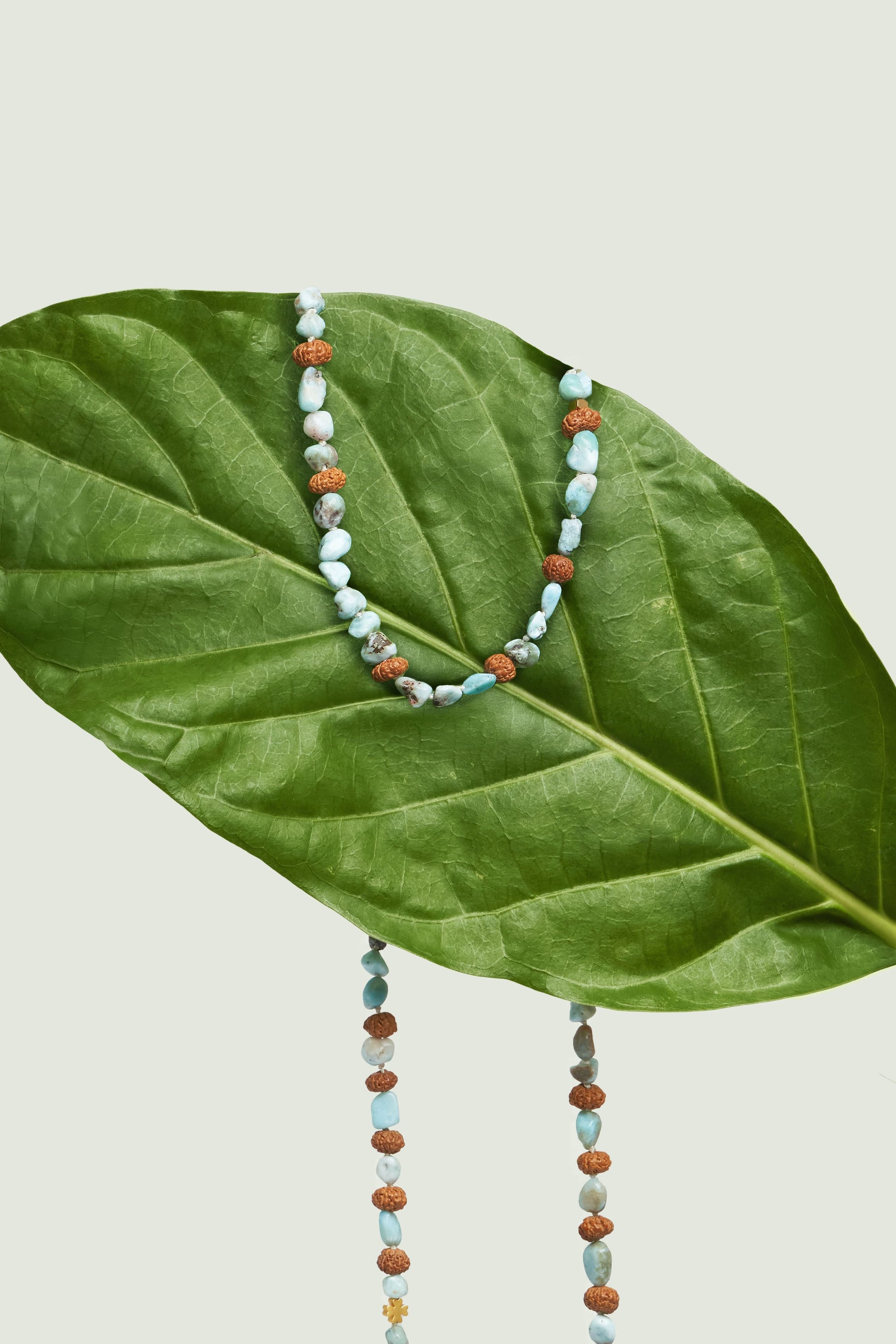 Glam gold eyewear chain with precious stone, handcrafted for modern women in Bali.