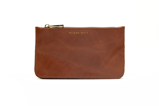 Premium leather pouch handmade in Kerobokan, fits eyewear and mobile securely.