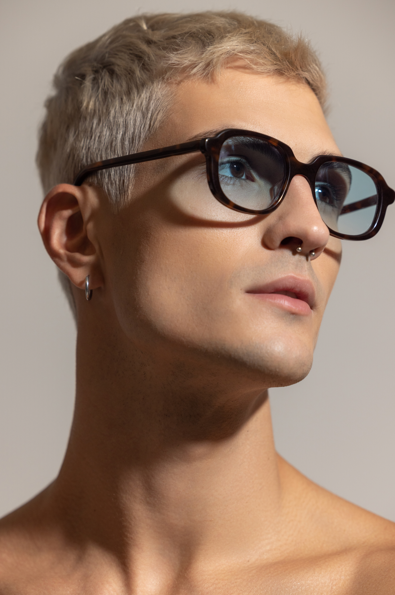 Handcrafted polarized Maison Mata sunglasses featured on a man during a studio shoot in Bali guided by opticians.