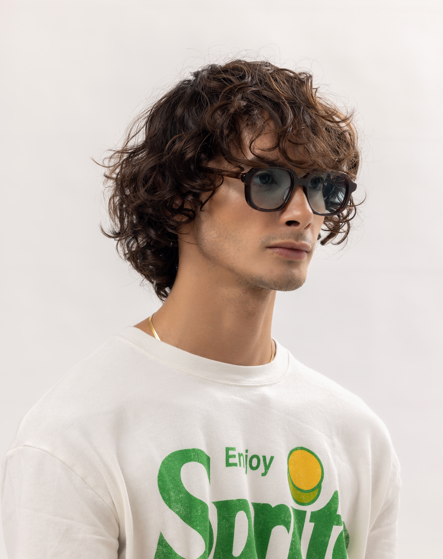 Maison Mata polarized handmade sunglasses styled on a man in a minimalist Bali villa scene for modern eyewear lovers.