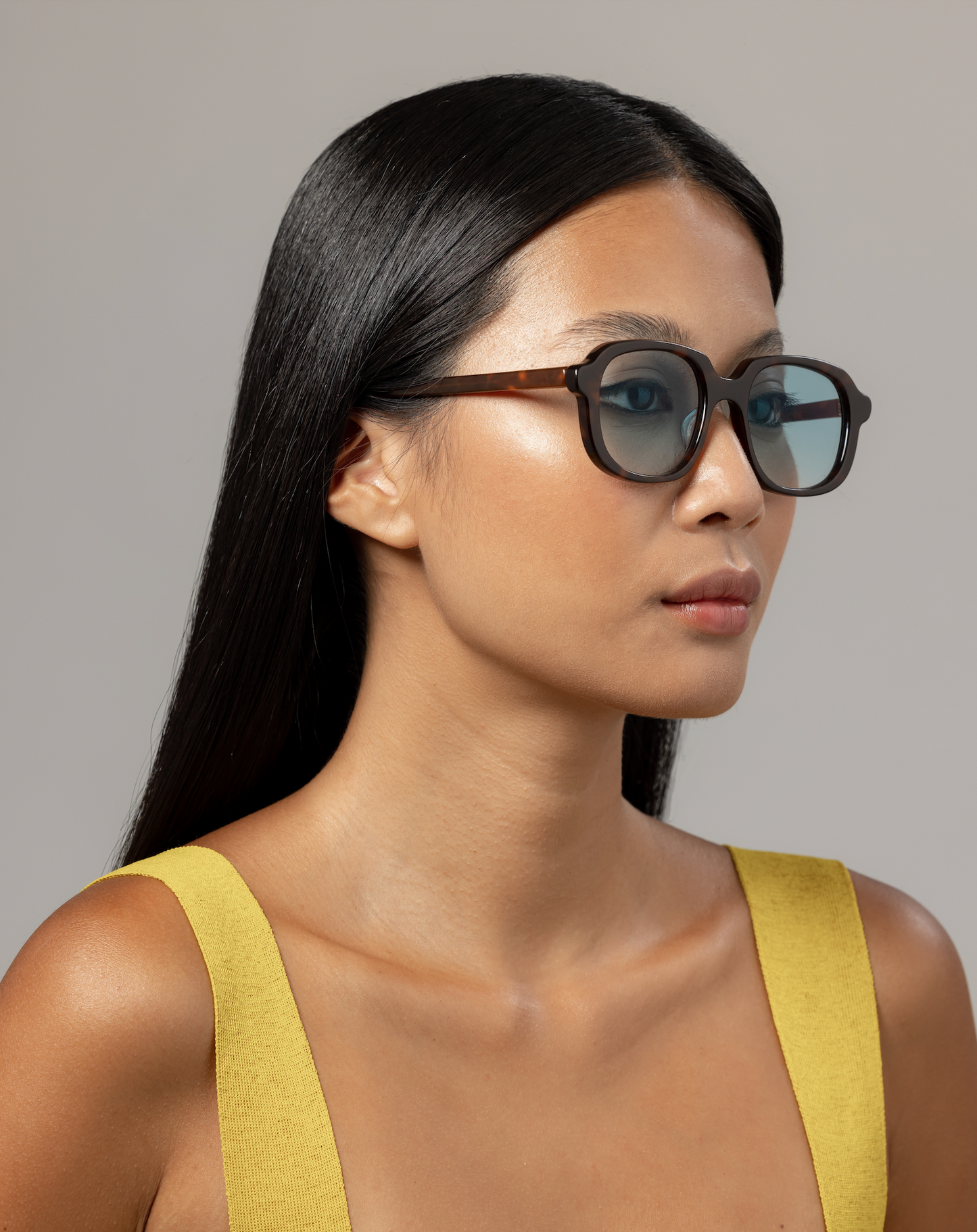 Handmade polarized aviator sunglasses in acetate styled on a woman at a Bali villa in Seminyak by Maison Mata opticians.