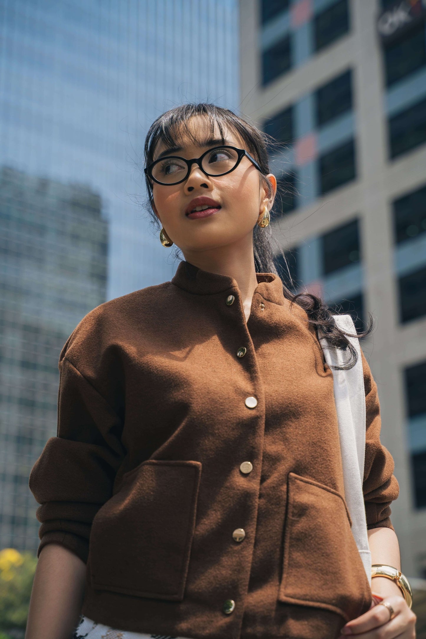 Woman wearing Cove Onyx Night black acetate optical frames Maison Mata eyewear