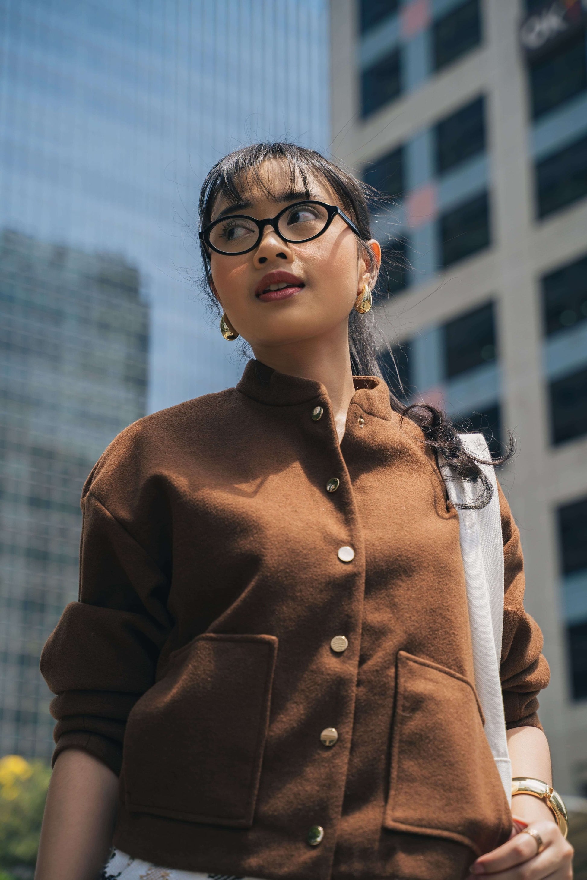 Woman wearing Cove Onyx Night black acetate optical frames Maison Mata eyewear