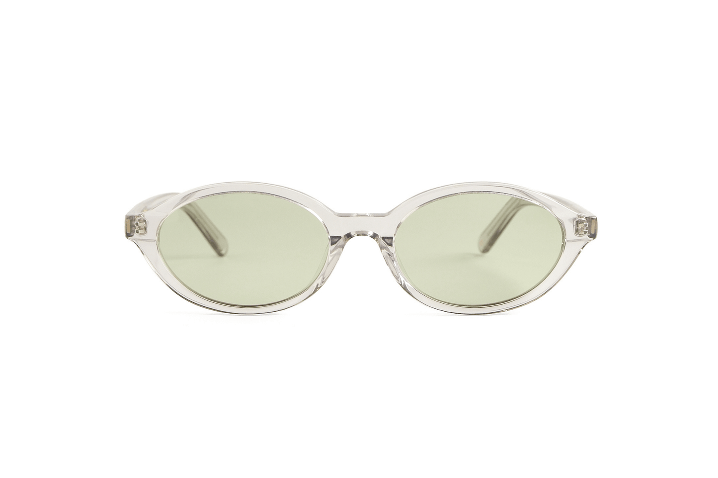 Oval slim tortoise acetate polarized sunglasses adjusted by optometrists in Ubud in Bali for bright tropical wear.