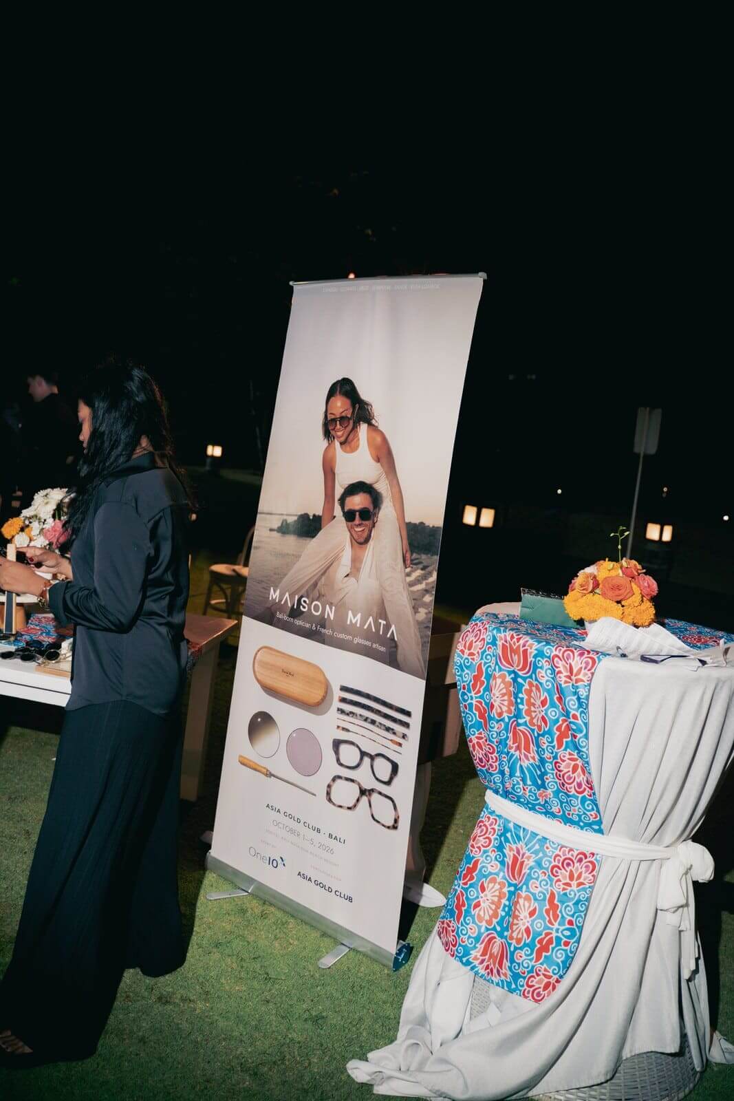 Maison Mata stand and banner at an evening welcome reception in Bali