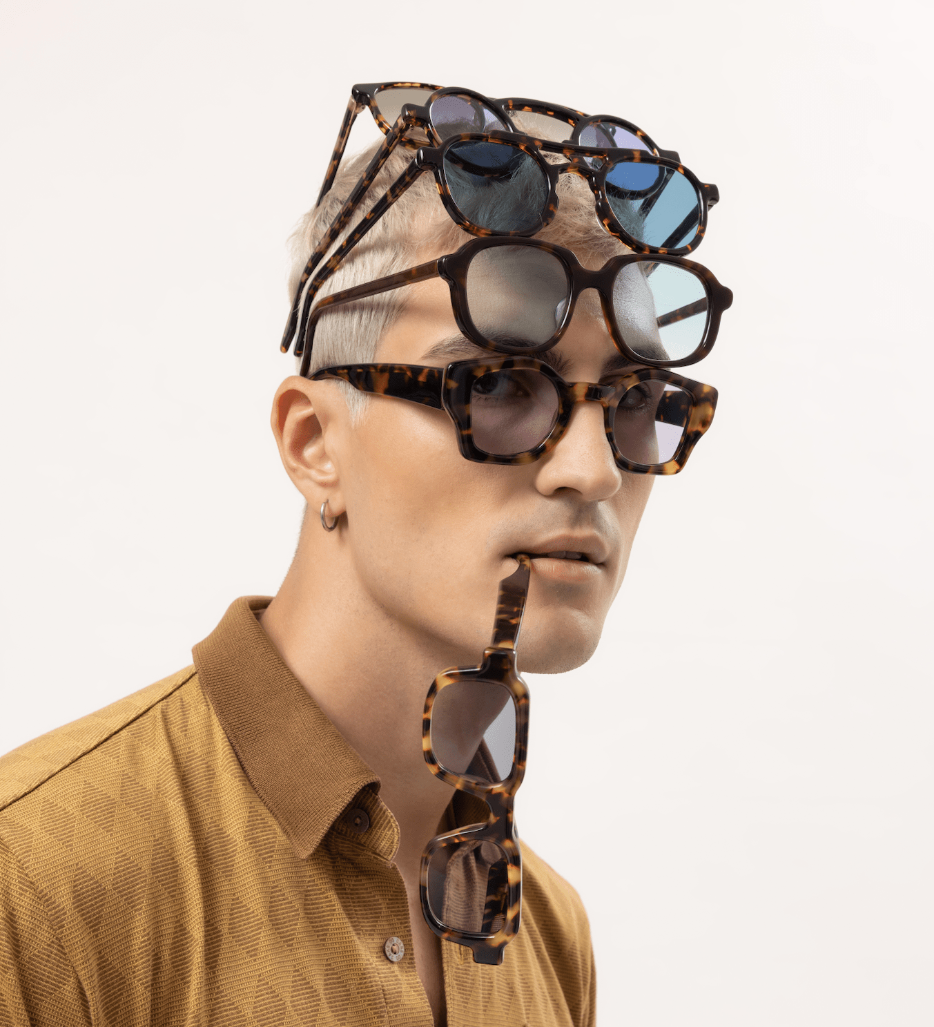 Handmade acetate eyewear seen on a man in Seminyak in Bali and fitted by Maison Mata opticians for refined style.