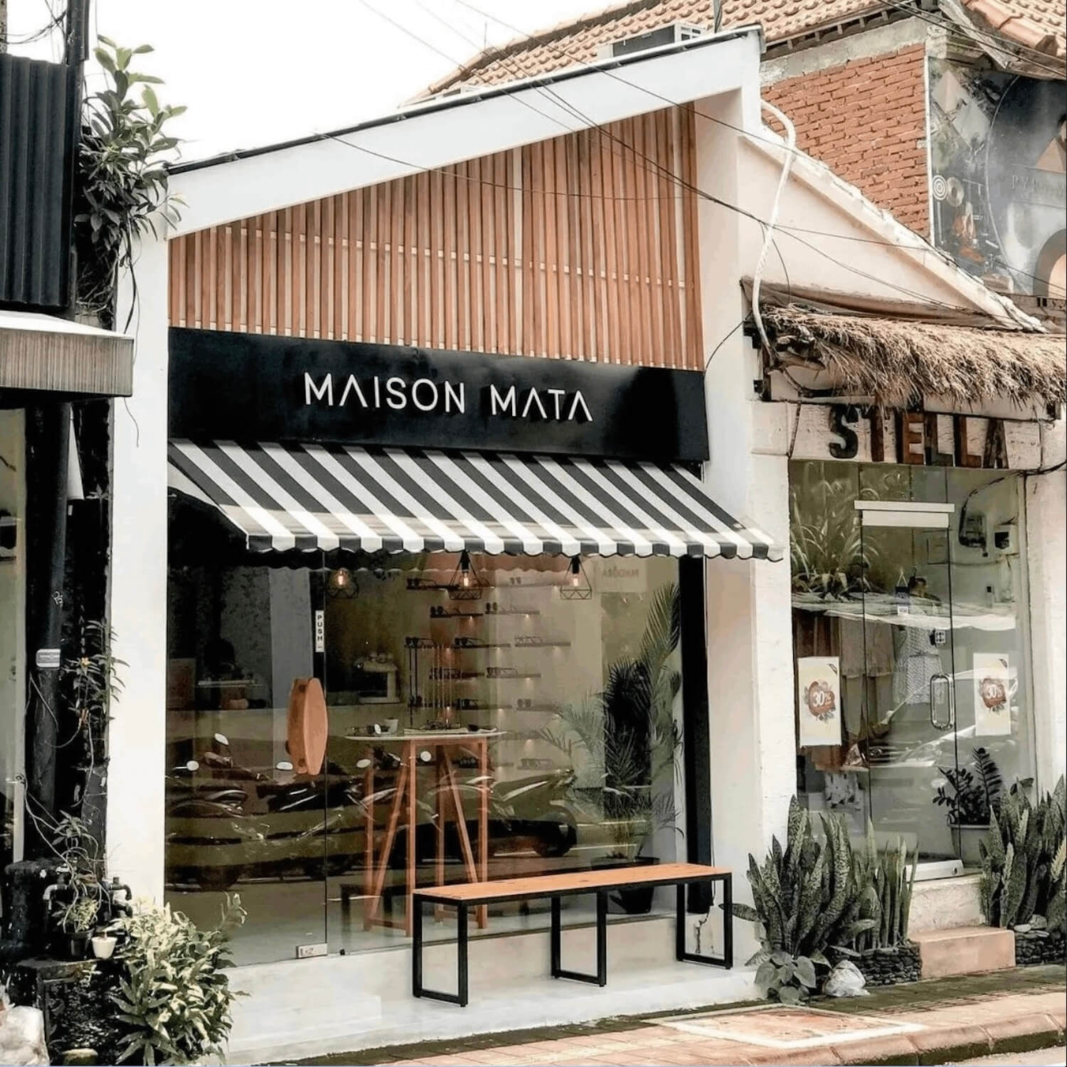 Maison Mata eyewear boutique in Ubud Bali, handmade sunglasses and optical frames displayed in warm interior design.