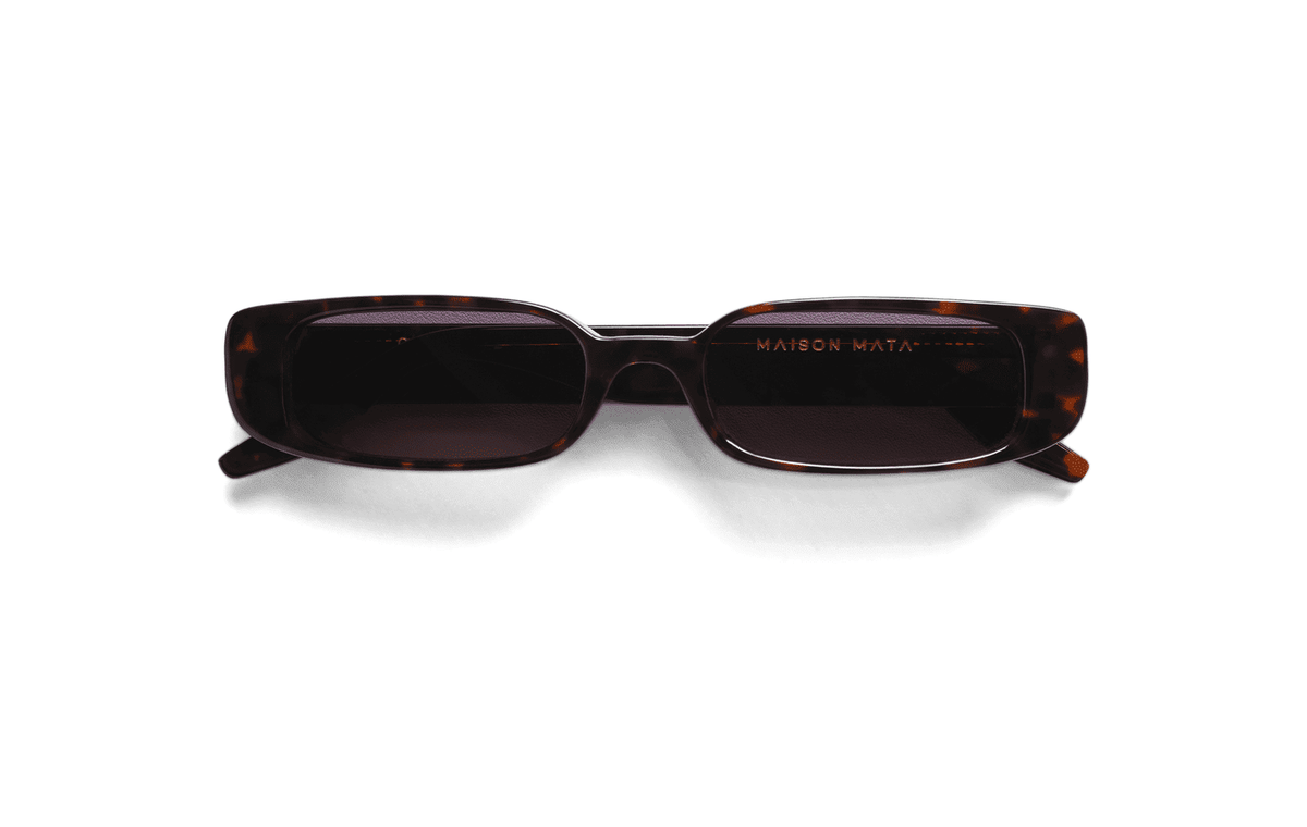 Maison Mata Marcus tortoiseshell acetate rectangular sunglasses, three-quarter view with grey lenses