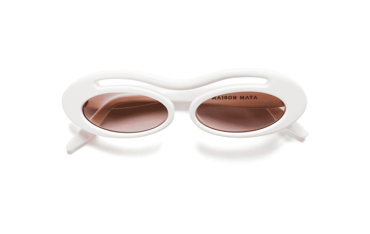 Maison Mata Moon river white acetate oval sunglasses, three-quarter view with brown gradient lenses