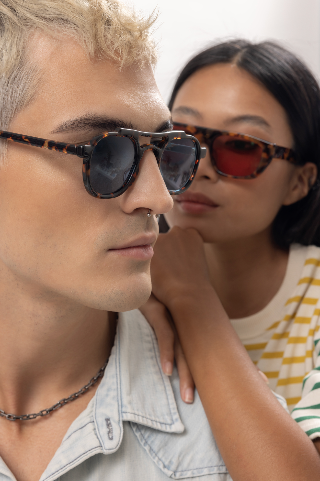 Handmade unisex acetate sunglasses worn by a couple in Canggu in Bali styled and adjusted by Maison Mata opticians.