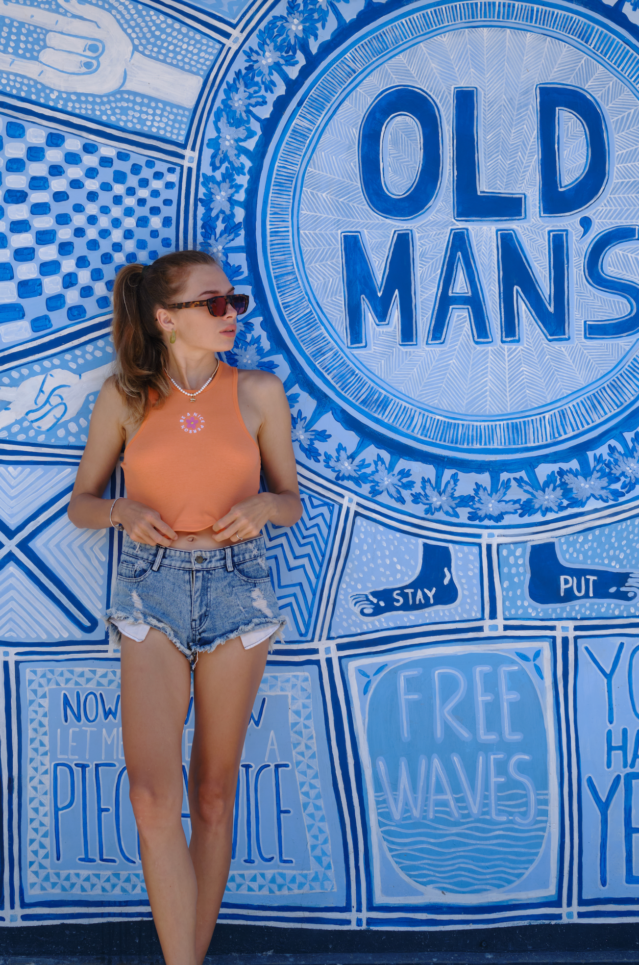 Handcrafted aviator polarized sunglasses showcased on a woman in Uluwatu in Bali, acetate frames fitted by Maison Mata opticians.