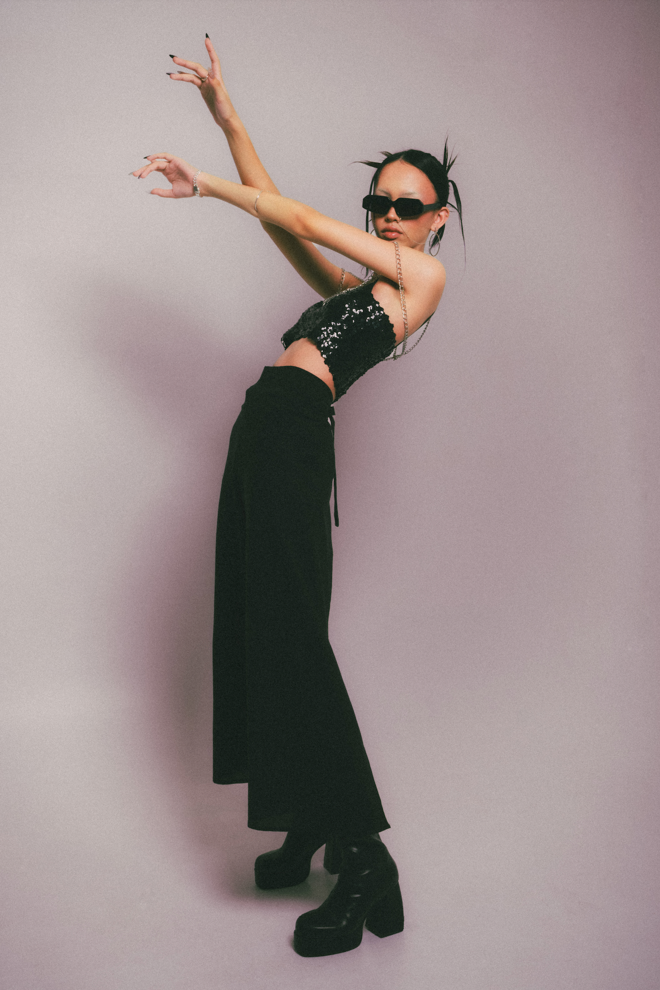 Rectangular handmade polarized sunglasses styled on a female model in Seminyak in Bali and adjusted by professional optometrists.