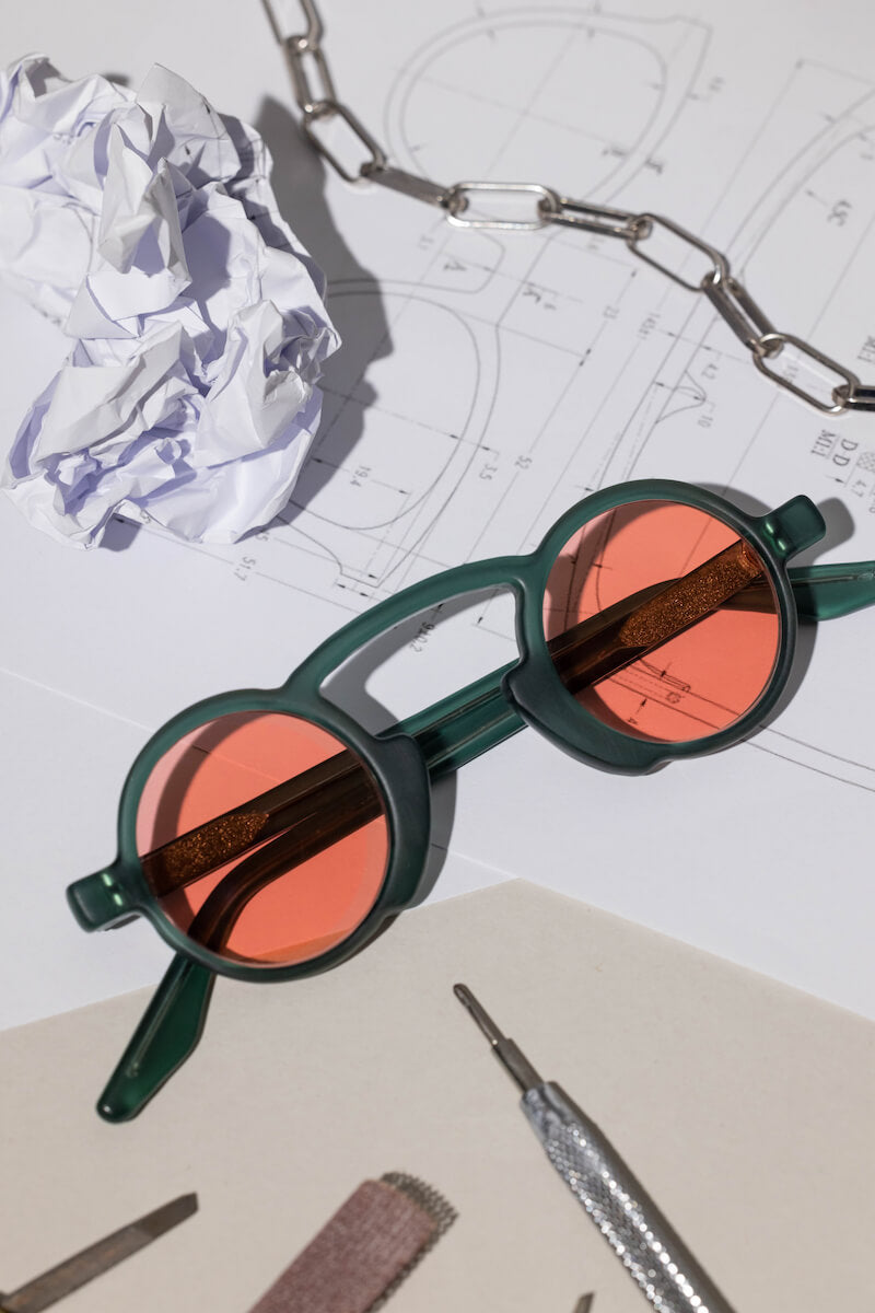 Handmade green acetate sunglasses for men fitted by opticians in Kuta in Bali for clean designer summer style.