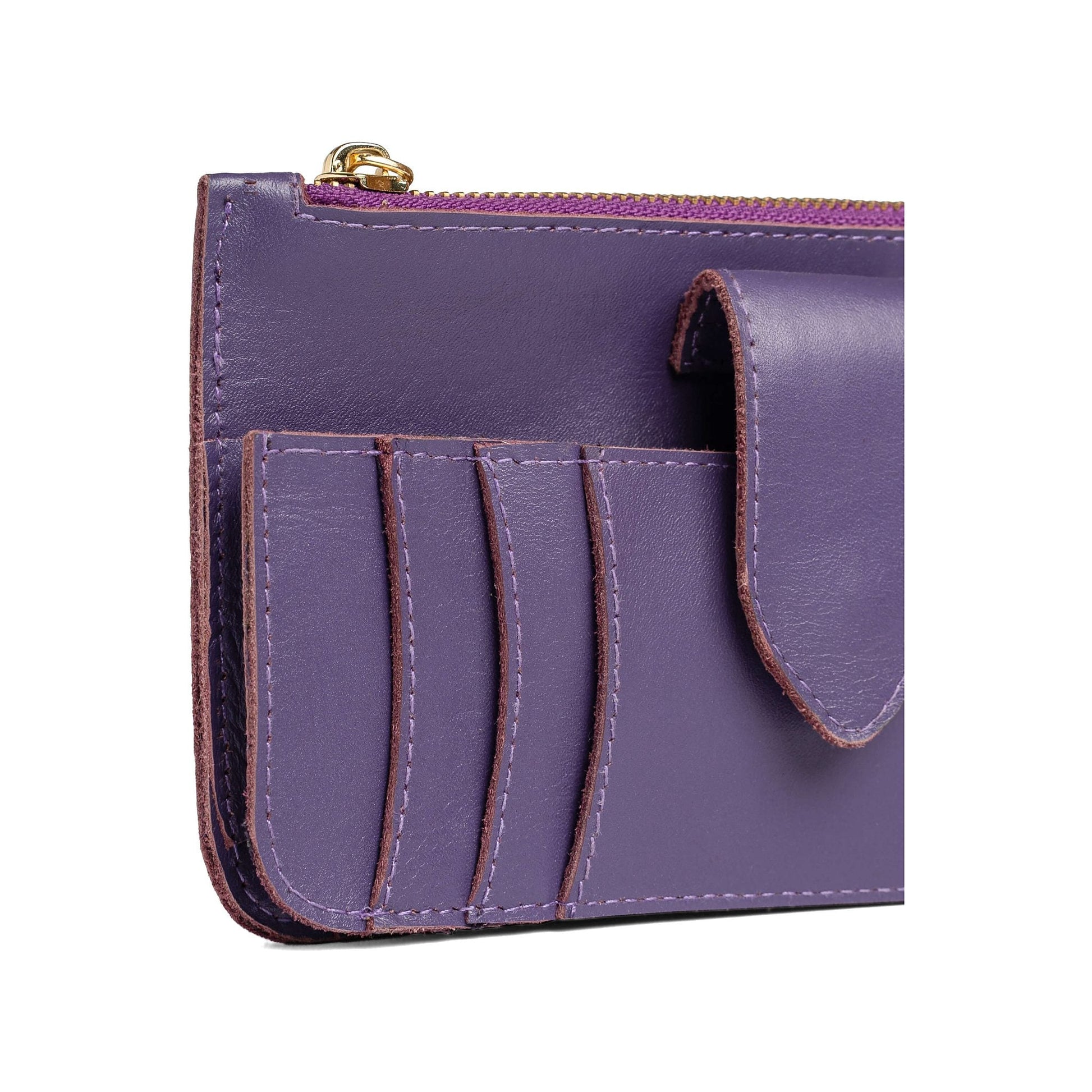 Three-quarter view of the Maison Mata purple leather wallet showing the zip and card pockets