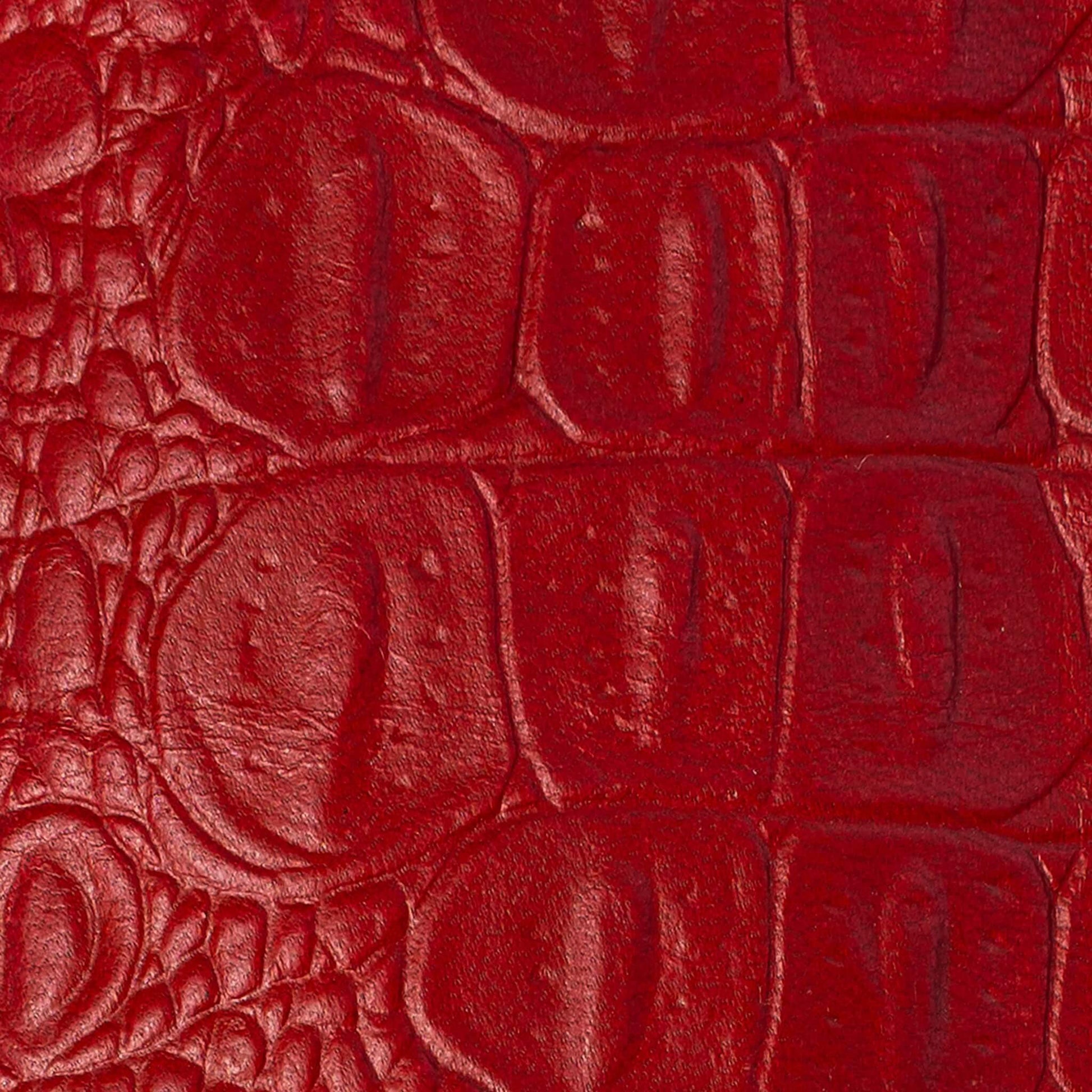 Close-up of the croco-embossed leather on the Maison Mata red croco softcase