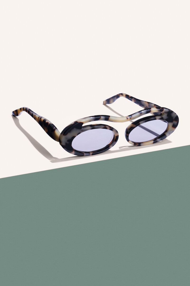 Sunglasses handmade oval tortoise acetate for men with UV protection fitted by optometrists in Bali.