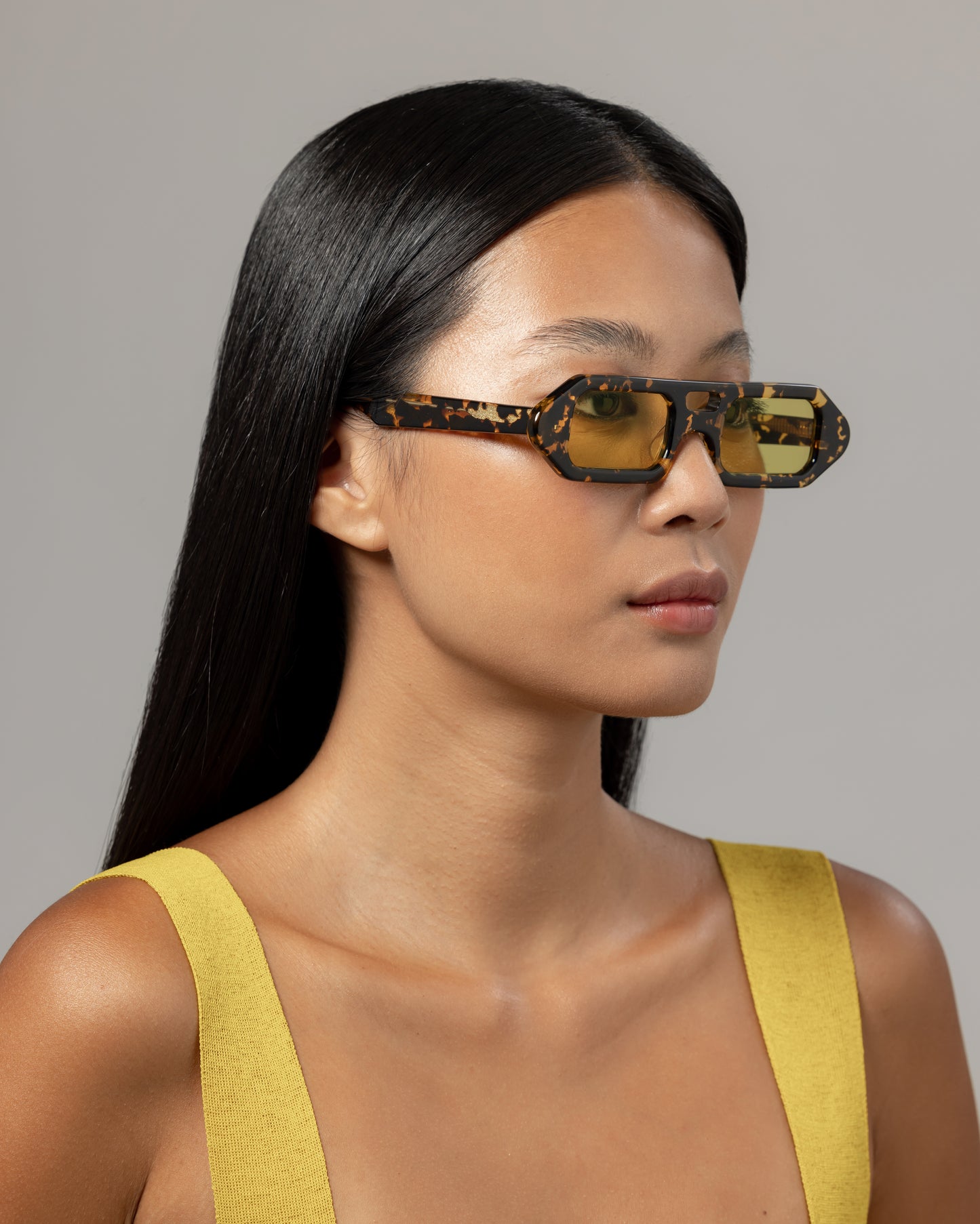 Limited edition handmade polarized sunglasses for women captured in Uluwatu in Bali expertly fitted by Maison Mata optometrists.