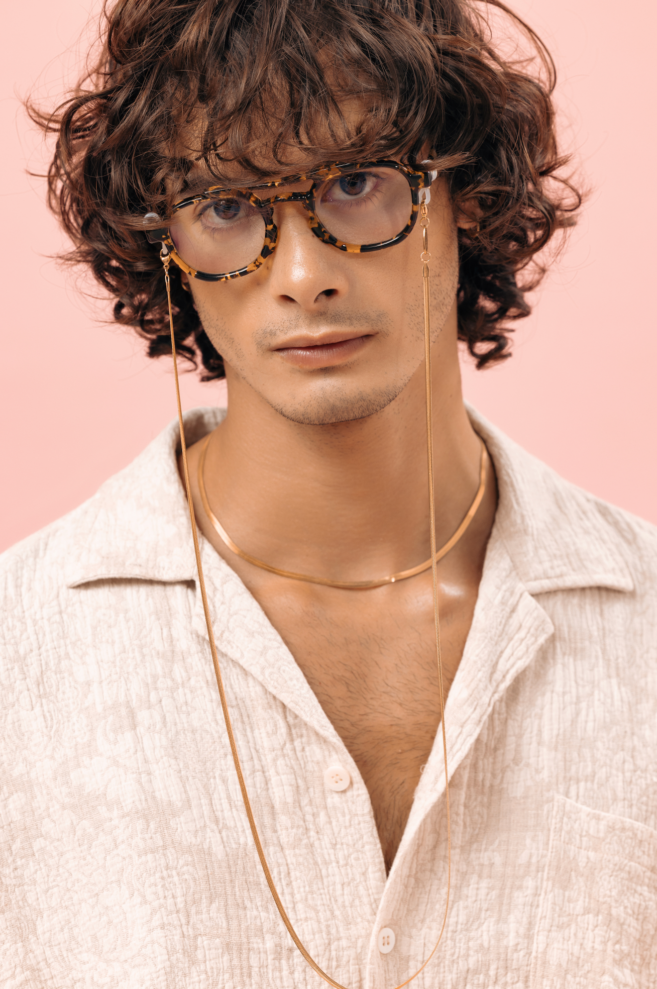 Handmade blue-light eyeglasses worn by a man in Ubud in Bali professionally adjusted by Maison Mata opticians.