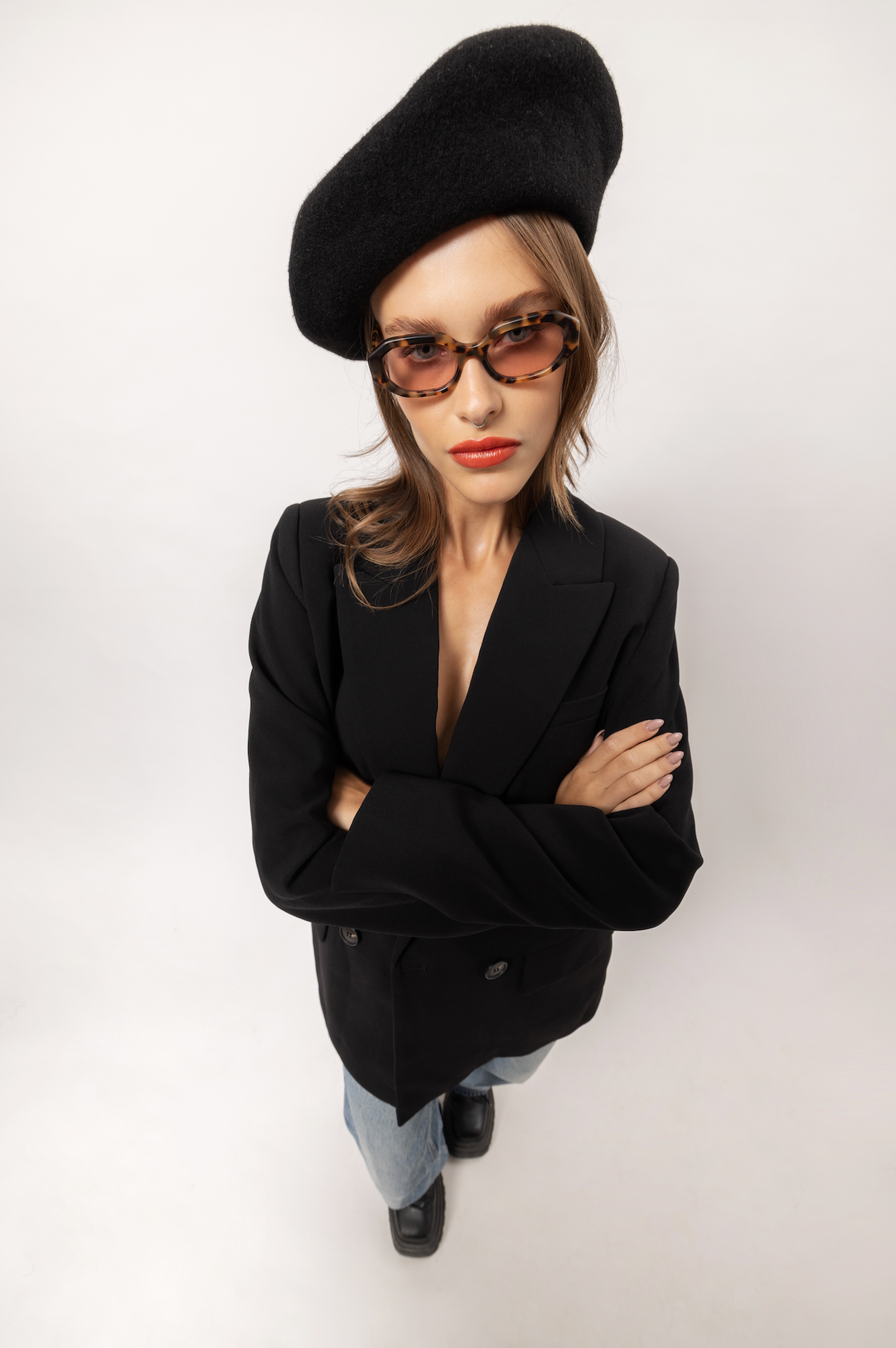 Sustainable handmade polarized frames showcased on a woman in Seminyak in Bali and fitted by Maison Mata opticians.